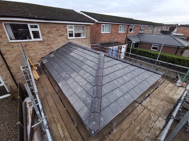 Slate grey roof tiles by DH Roofing Contractors in Norwich