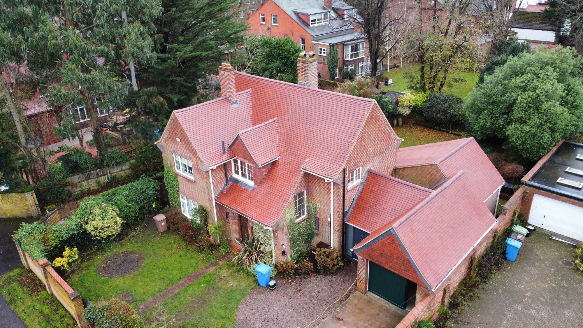 House with a newly tiled red roof seen from above