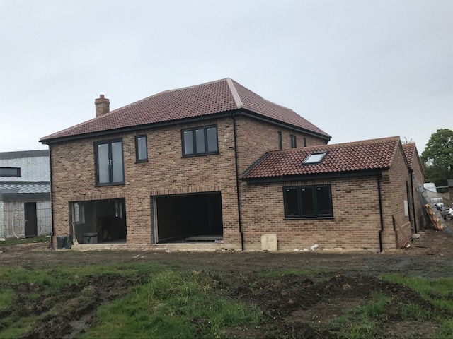 roof repair with tiles in Norwich, DH Roofing