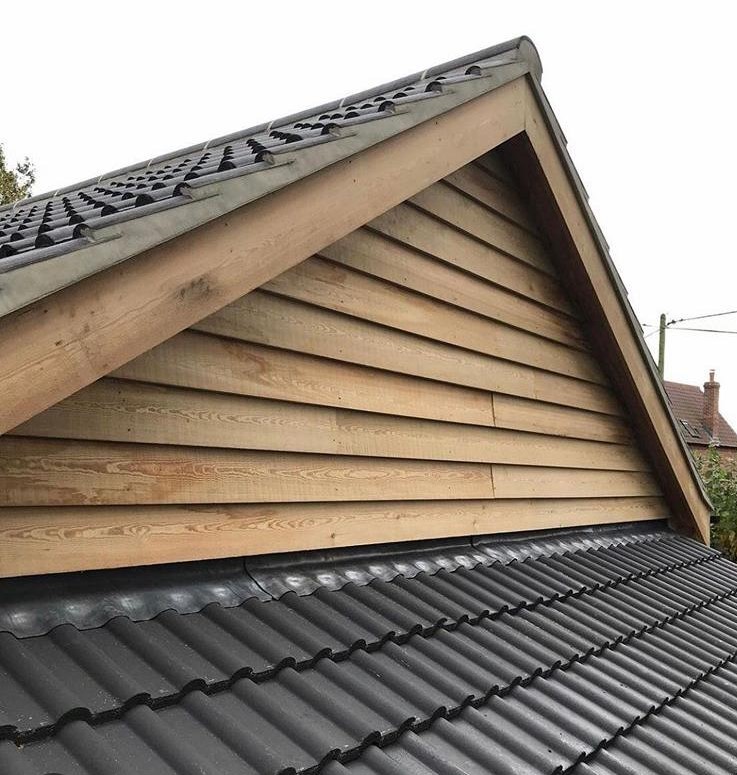 Finished slate and tile roof in Norwich