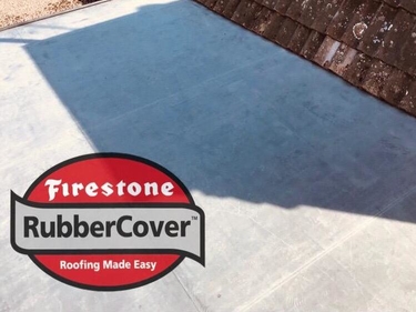 Flat roof finished in black EPDM rubber
