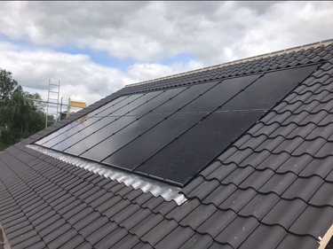 Solar panels fitted to a pitched roof